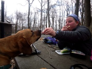 Sidekick Pauli makes friends with Bag Lady